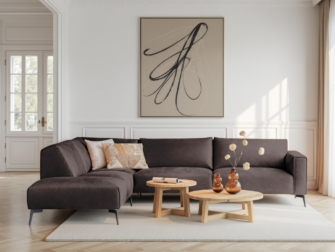 diep bruine kleurige hoekbank met robuuste afwerking en diepe zit