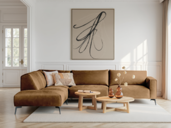 Goudbruine hoekbank met warme uitstraling en zachte bekleding