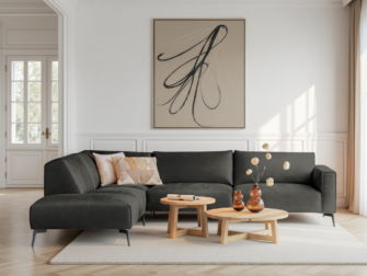 Diepgrijze hoekbank met luxe uitstraling en strakke lijnen