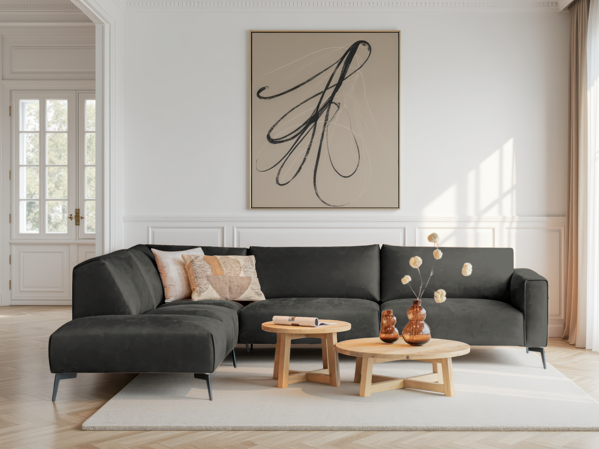 Diepgrijze hoekbank met luxe uitstraling en strakke lijnen