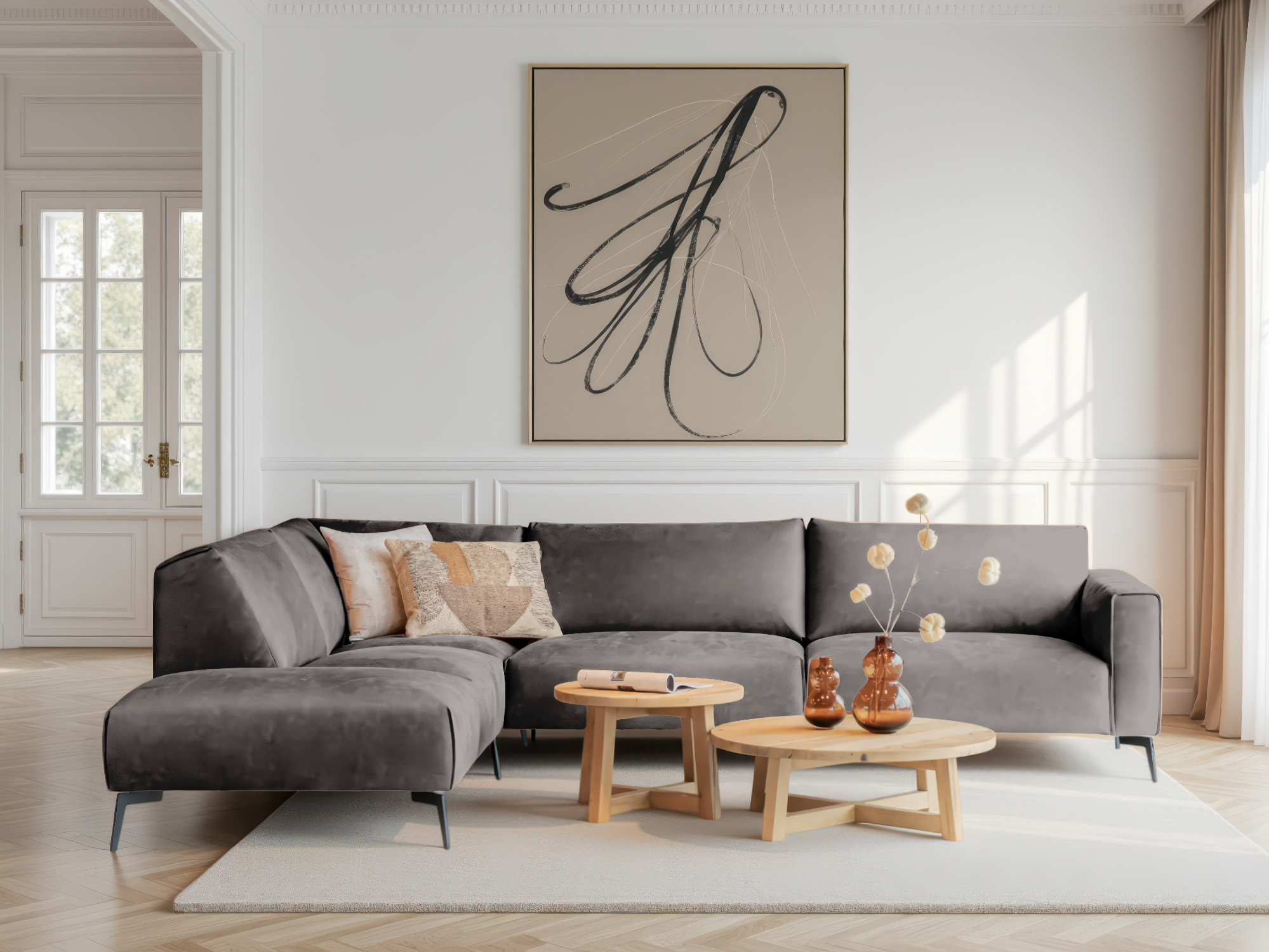 Grijze hoekbank met stevige kussens en minimalistische afwerking