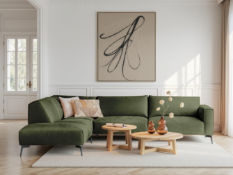 Donkergroene hoekbank met moderne vormgeving en comfortabele leuning