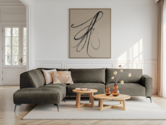 Donkergrijze hoekbank met ruime zit en moderne uitstraling