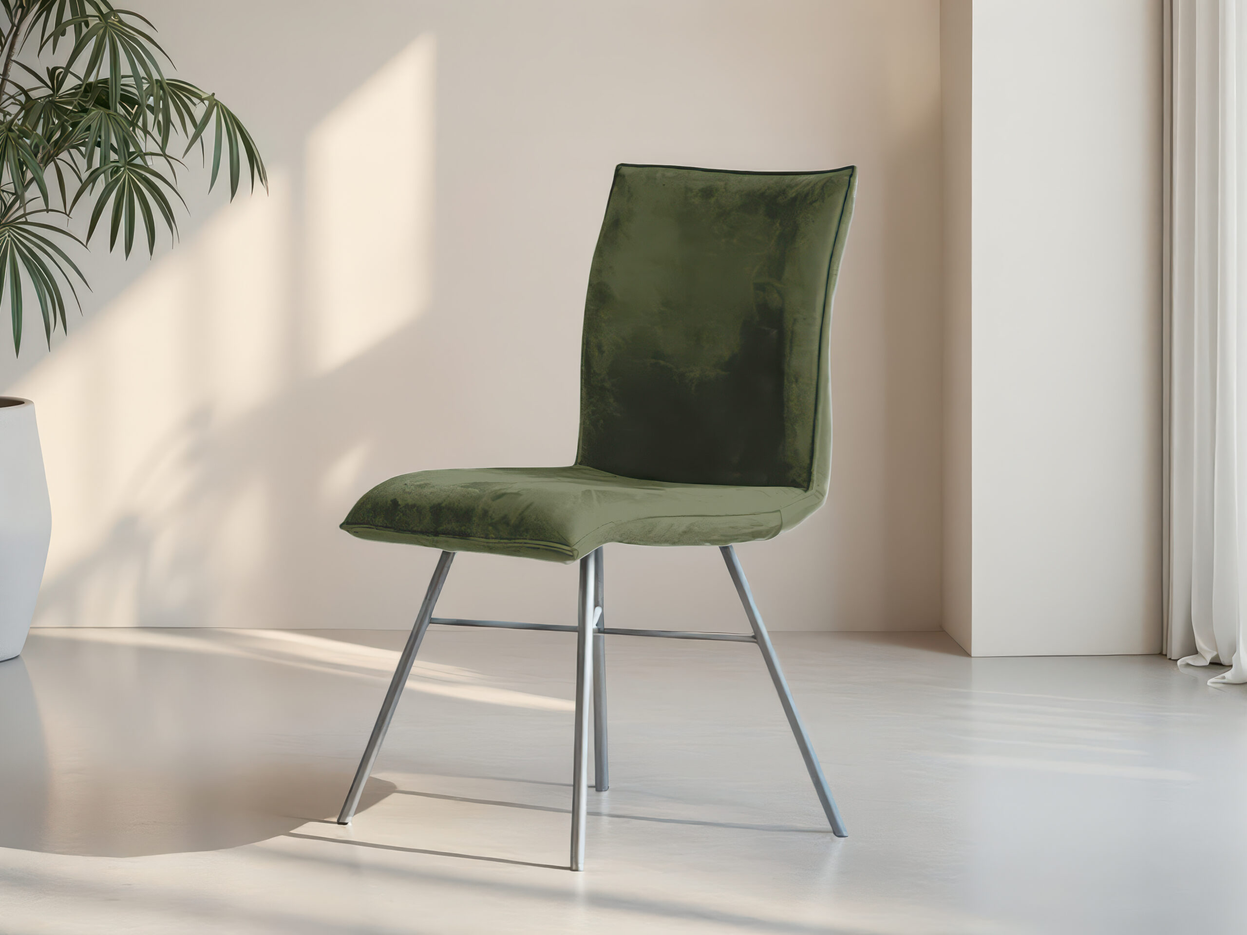 Groene eetkamerstoel met kruisframe onderstel en luxe suède bekleding