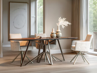 Half ronde eettafel met dun HPL blad en speels geometrisch metalen onderstel