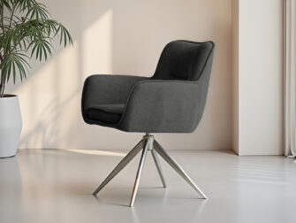 Designstoel in donkere tint met rechte, slanke poten in licht metaal