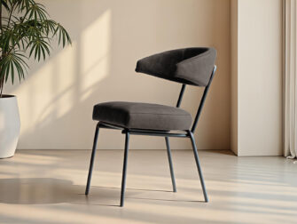 Eetkamerstoel in antraciet bekleding met moderne ruglijn en zwart frame