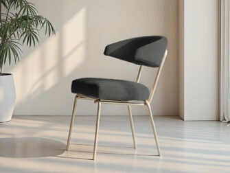Zwarte eetkamerstoel met open rugleuning in een zachte stof