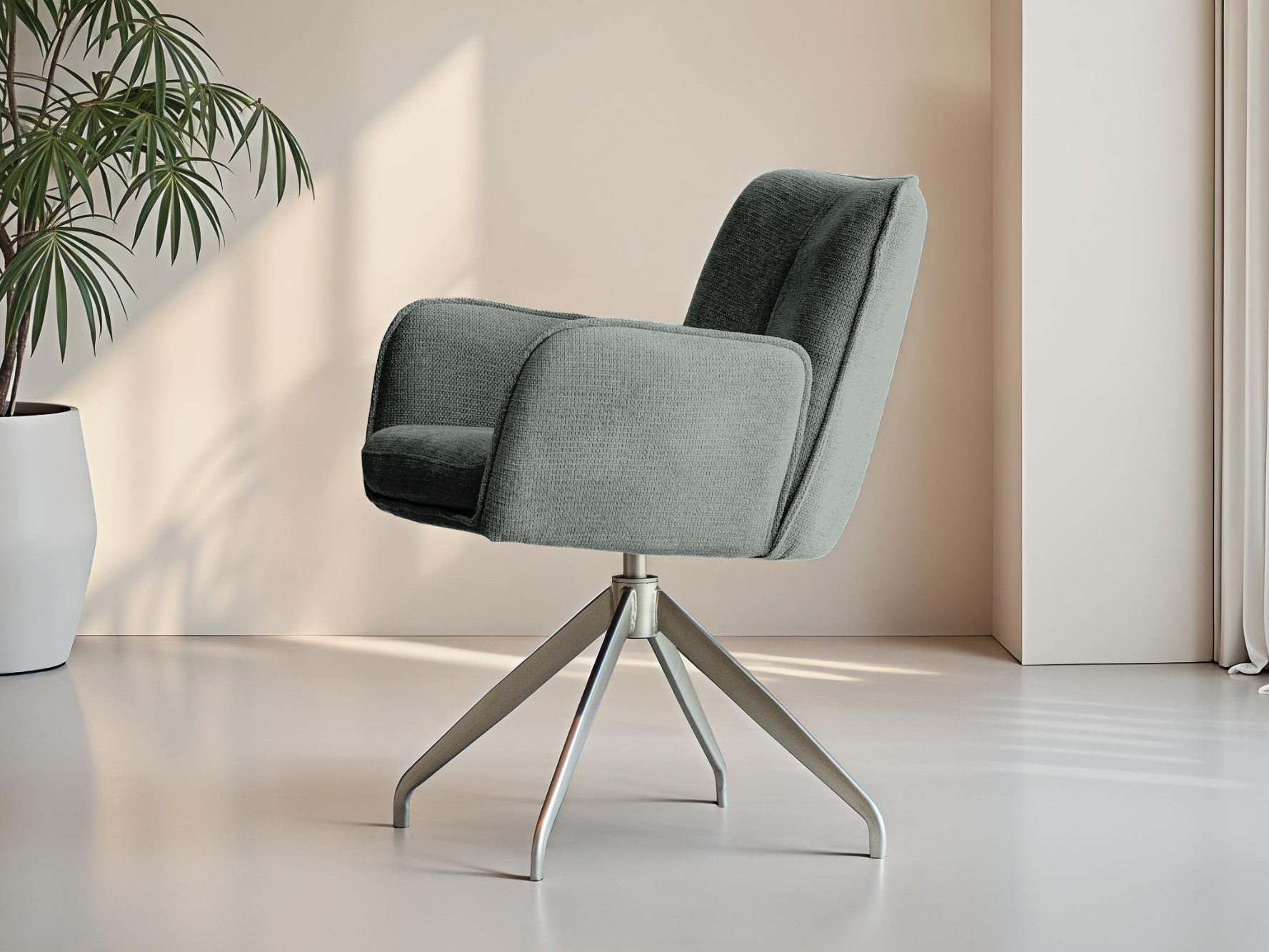 Eetkamerstoel met draaivoet en antracietgrijze bekleding, met een zachte kuipzitting en subtiele rondingen