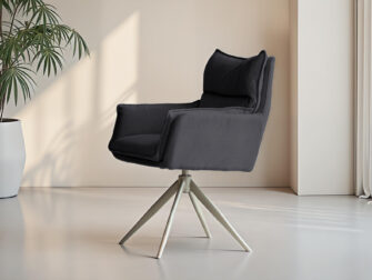 Donkergrijze eetkamerstoel met zachte stoffering en moderne uitstraling