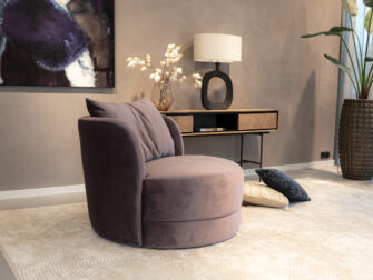 Ronde fauteuil volledig gestoffeerd in lila velvet stof