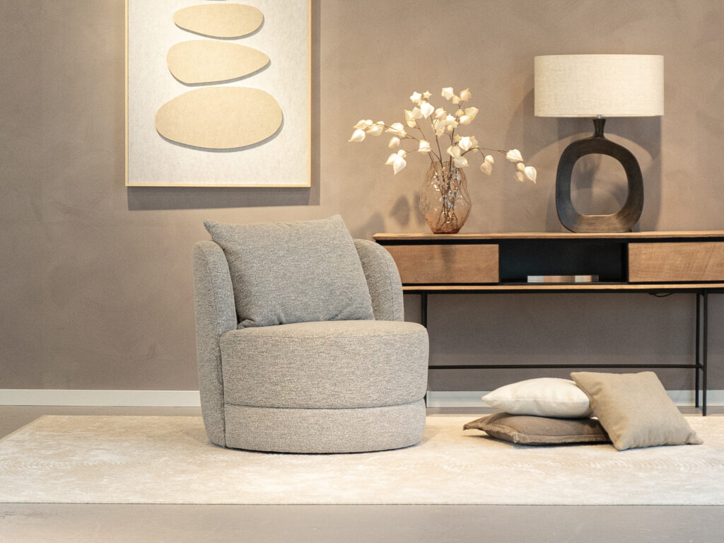 Draaibare fauteuil in grijze boucle stof