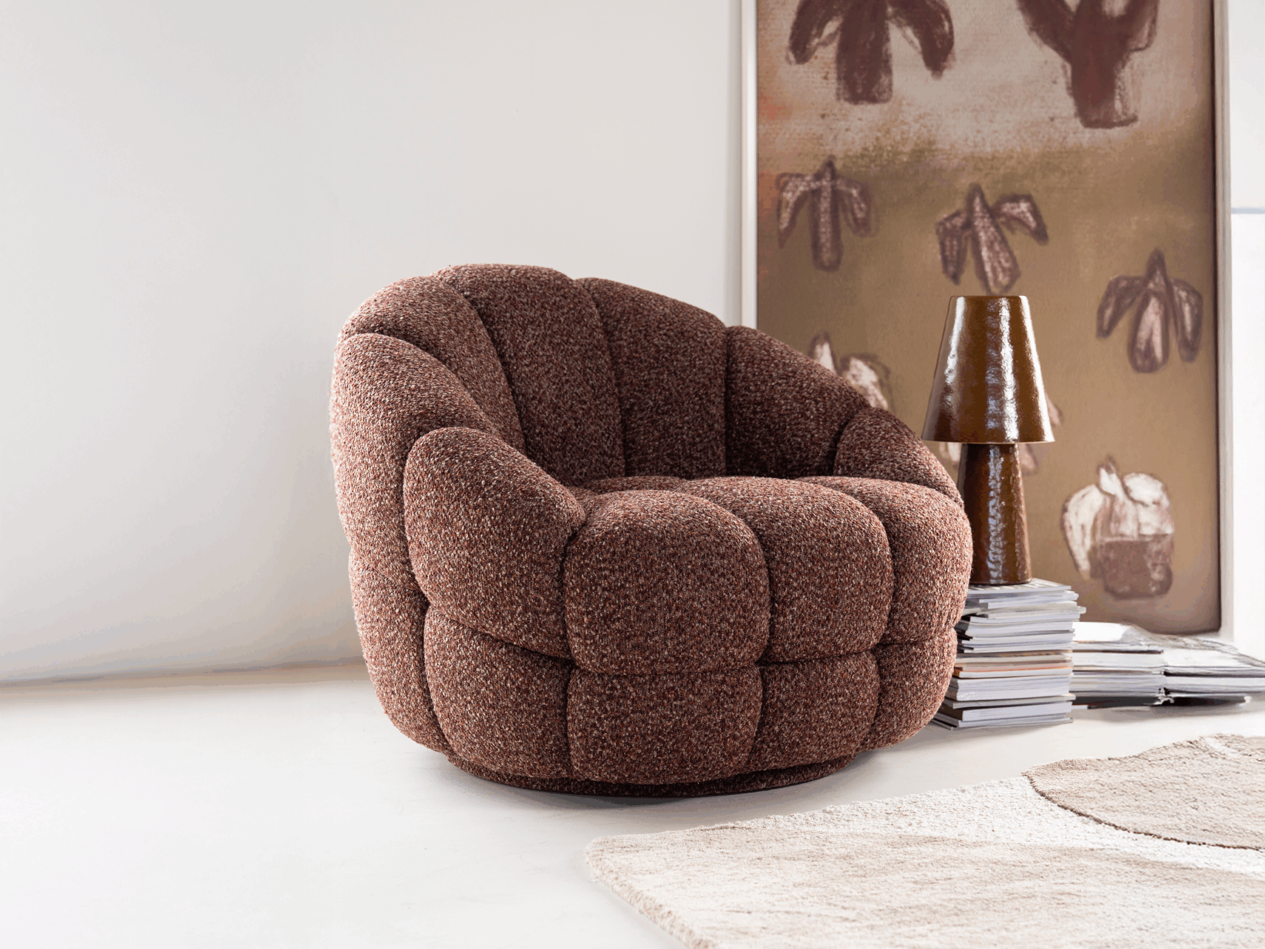 Fauteuil met volumineuze blokstructuur en zachte gestoffeerde print