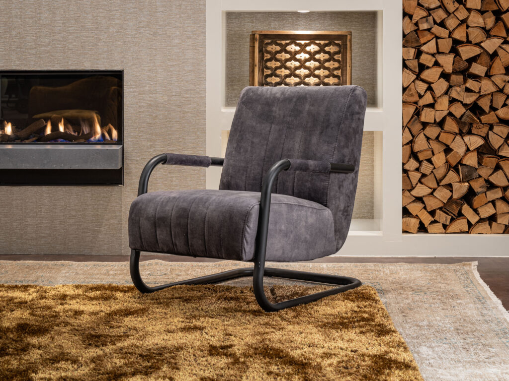 grijze brede leren fauteuil